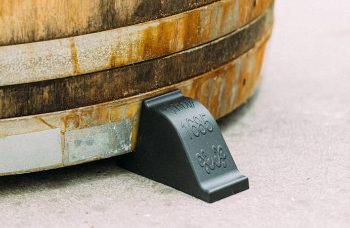 OAKENZ barrel feet enhancing the look of a  half wine barrel planter